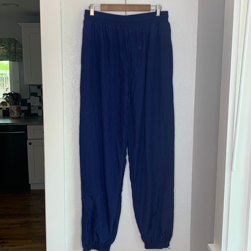 Kobe navy blue nylon pants lined pull on zip ankle zip pockets